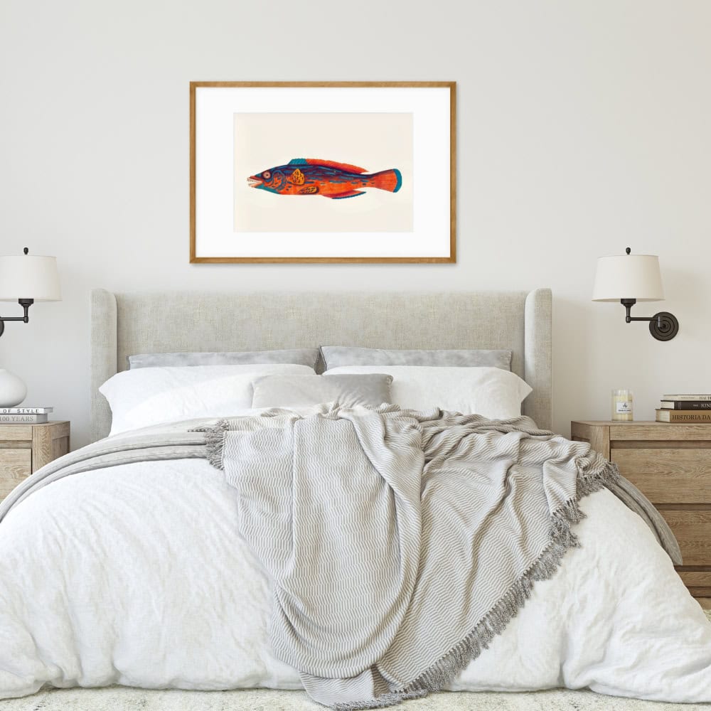 fish art print on wall above bed